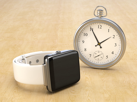 A modern smartwatch against a vintage watch