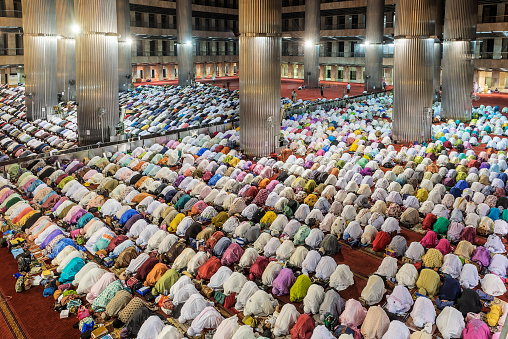 men and women praying inside Istiqlal mosque, Jakarta during Ramadan month