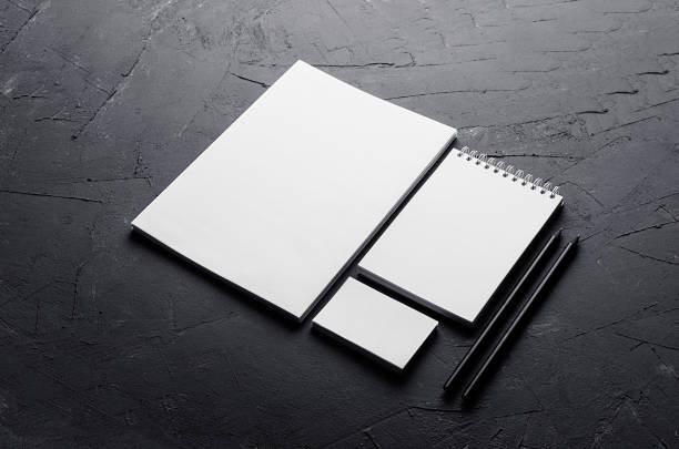 istock Blank stationery on elegant dark grey concrete texture. Corporate identity template. Mock up for branding, graphic designers presentations and portfolios. Top view. 696501564