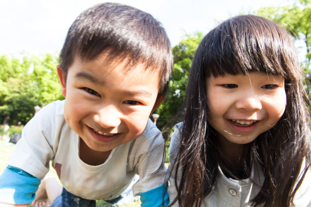 istock Kids crawling around on all fours 696504476