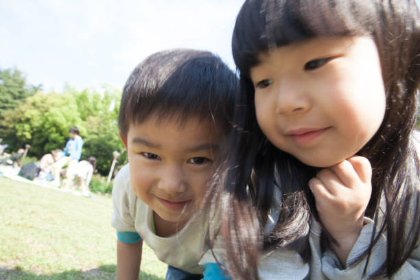istock Kids crawling around on all fours 696504592