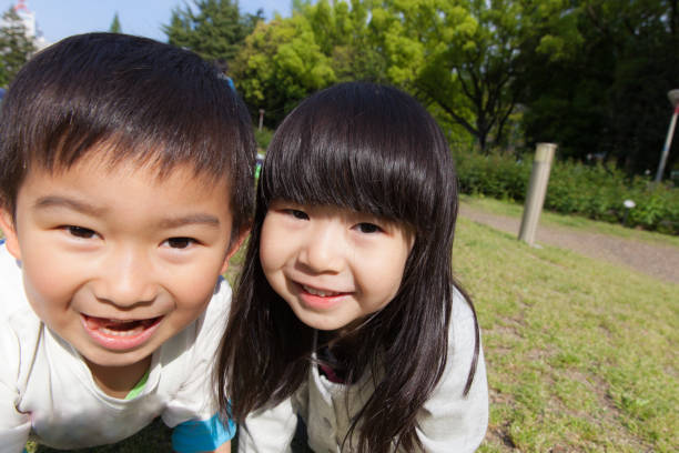istock Kids crawling around on all fours 696506762