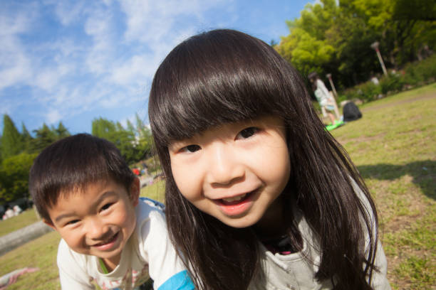 istock Kids crawling around on all fours 696507626