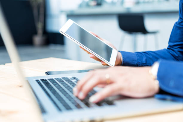 istock young asian man with laptop in modern cafe 696507656