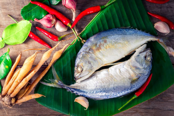 istock Mackerel on banana leaf,Thai food. 696507668