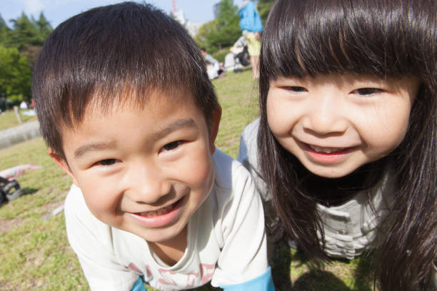 istock Kids crawling around on all fours 696507698