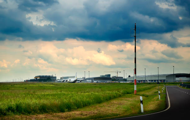 istock transport plane stands on the runway, in rainy 696511040