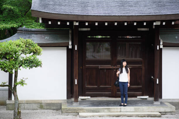 Japanese woman traveling alone in Japanese temple Japanese woman traveling alone Japanese woman traveling alone in Japanese temple Japanese woman traveling alone in Japanese temple A Japanese woman traveling alone