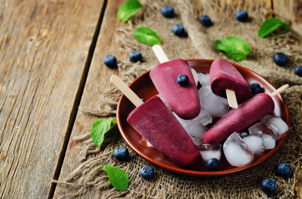 istock Blueberry Ice cream with fresh blueberries and ices 696517304