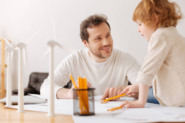 istock Positive delighted bearded man having conversation with his 696518658