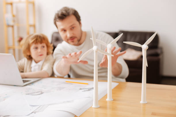 istock Attentive boy listening to his father 696521784