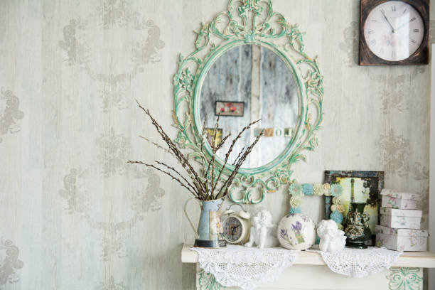 istock Vintage interior with mirror and a table vase and willows 696526744