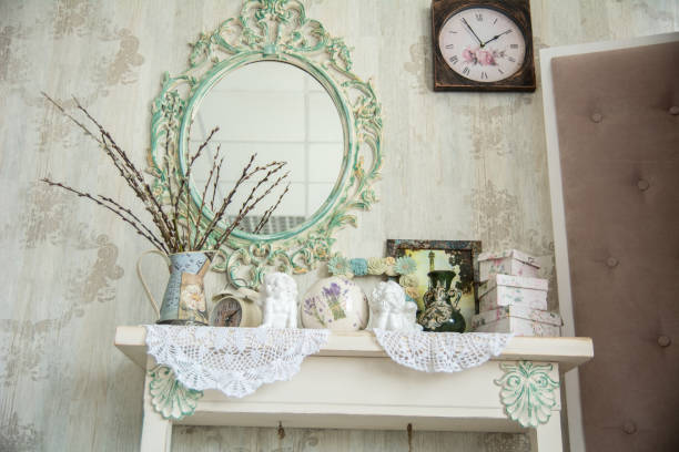 istock Vintage interior with mirror and a table with a vase and willows 696526810