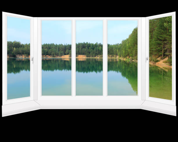 istock modern window to the summer forest lake 696529758