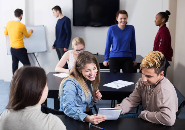 istock Girl consulting fellow student 696532120