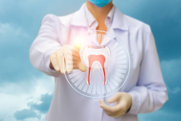 istock The dentist presses the tooth . 696532236