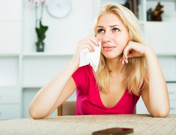 istock Girl crying with phone 696533138