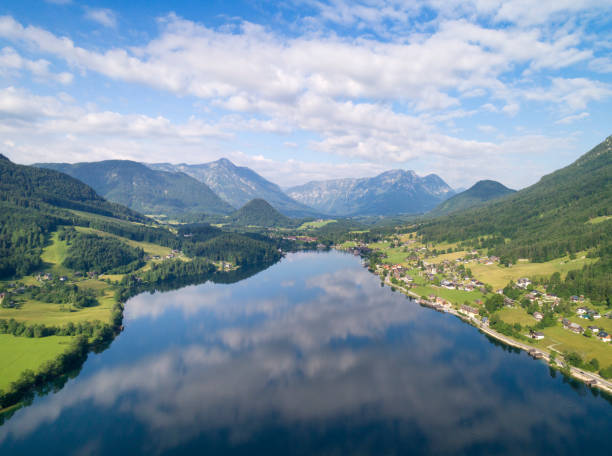 Sun rising over the beautiful Lake Grundlsee in the middle auf the Austrian Alps. Aerial View. Nature Reserve. Steiermark. Ausseerland.