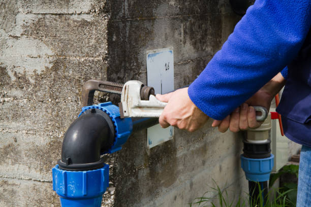istock plumber at work in wastewater treatment plant 696544032