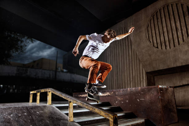 istock Skater jumping on his skate in skatepark 696544498