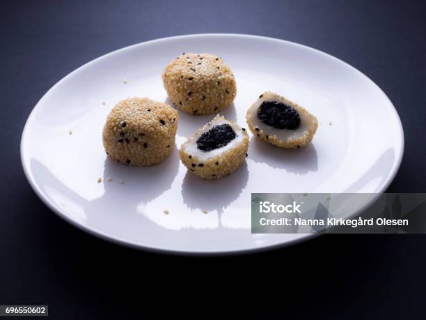 Japanese Sesame Mochi On Black Background Stock Photo - Download Image Now - Asia, Asian Food, Black Background