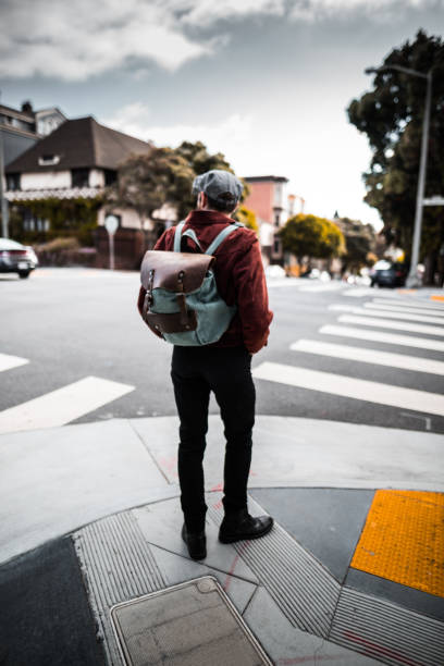 istock hipster walking on the streets of san francisco 696553826