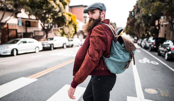 istock hipster walking on the streets of san francisco 696554018