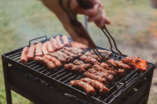 istock Meat on a barbecue stove. 696557430