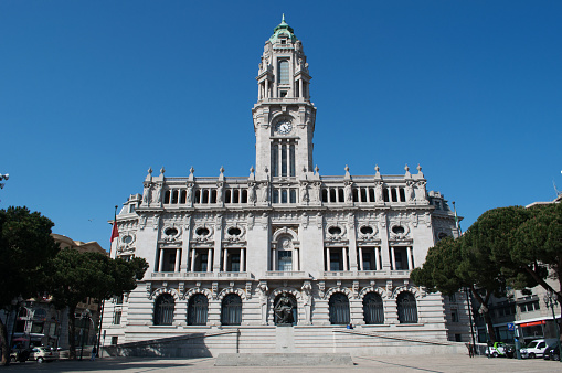 Porto, Portugal - March, 26, 2012: view of Porto City Hall, built at the beginning of the 20th century, one of the most famous monuments of the Old City with the 70 metres high tower with a carillon clock