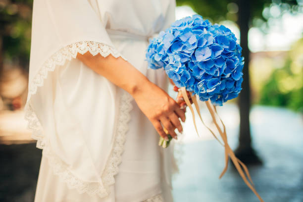 istock Wedding bouquet in hands of the bride 696561558