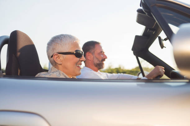 istock Mature couple at car 696584734