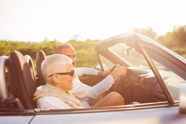 istock Mature couple at car 696584760