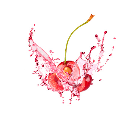 Blast of cherry with juice on white background