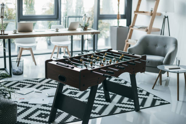 istock Foosball at modern office interior, close-up view 696594142