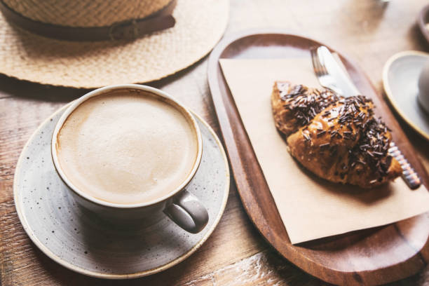 istock Coffee and croissant breakfast in the cafe 696594864