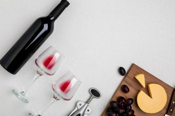 istock Wine, glasses and corkscrew over white background. Top view 696600636