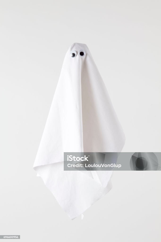 ghost back white white sheet ghost isolated on a white background. Tones on tones photography Ghost Stock Photo