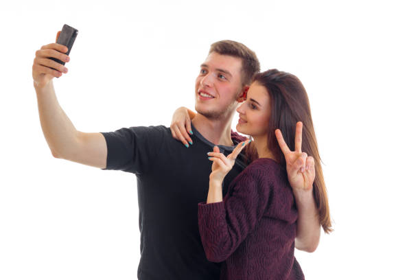 istock cute young couple make selfie in Studio 696604090
