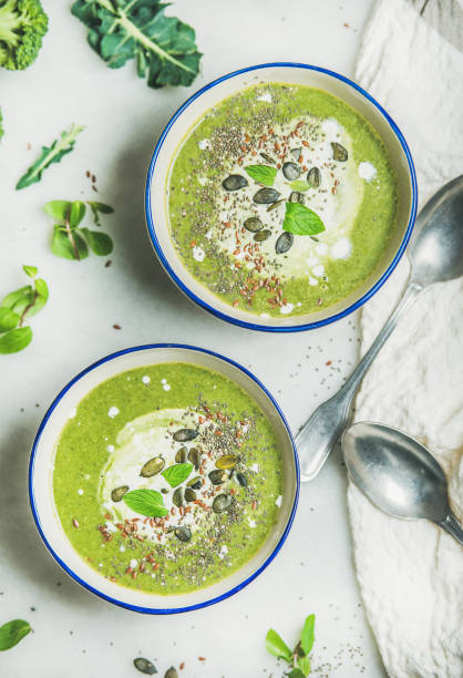 istock Spring broccoli cream soup with fresh mint and coconut cream 696608526