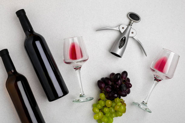 istock Two glasses of red wine and grapes. Top view 696608754
