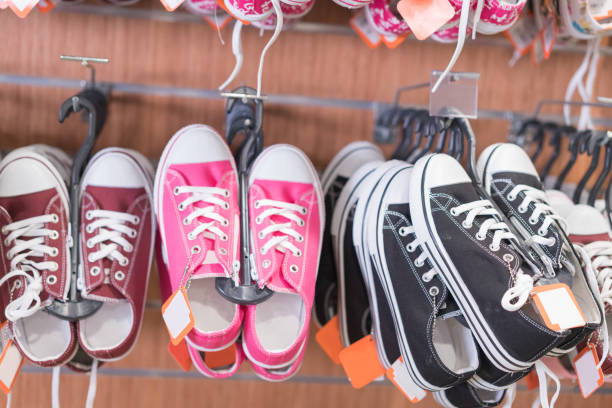 istock Shelves with casual shoes 696615202