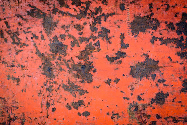 istock old red iron wall has rust and stains on the background 696615428