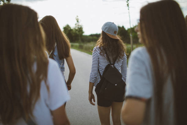 istock Girls on a way from school 696615492