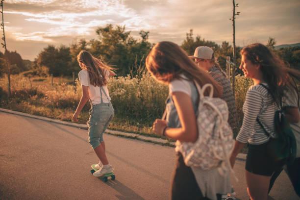 istock Girls on a way from school 696620066