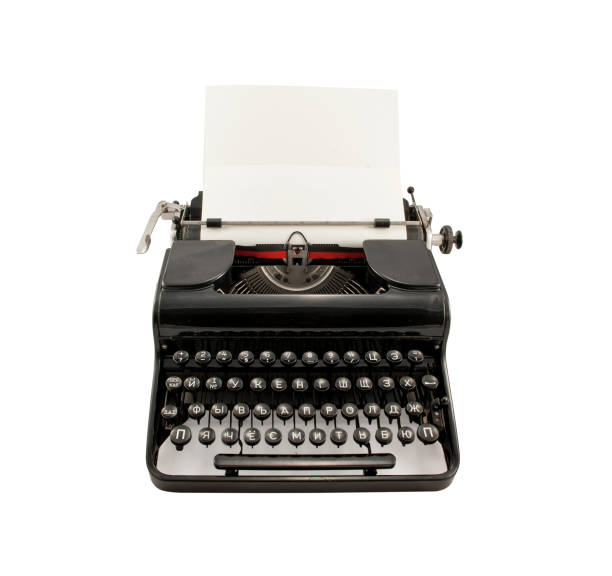 istock Old typerwiter with cyrillic letters on white background 696620936