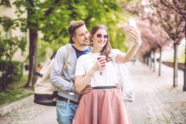istock Young couple spending time together in the city 696621096