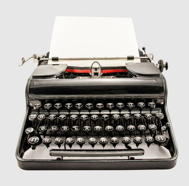 istock Old typerwiter with cyrillic letters on white background 696627196
