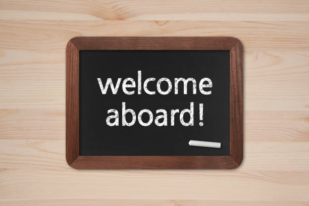 istock Welcome Aboard! - Business Chalkboard Background 696628136