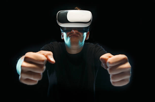 istock The man with glasses of virtual reality. Future technology concept 696631762