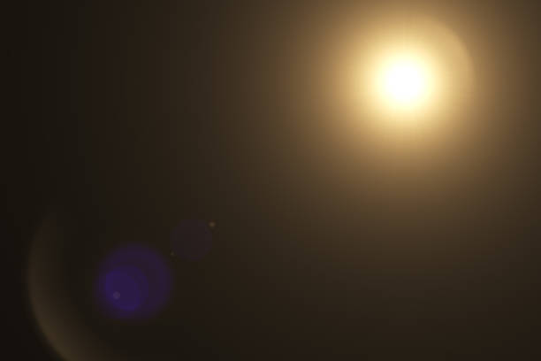 istock Glowing sun highlight effect on the lens of the lens 696632246